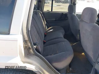 1996 Jeep Grand Cherokee Laredo with VIN 1J4FX58S2TC397006, listed as a IAAI auction lot 41836108 with 136,742 mi miles. Bid and sale history available at carsss.com. Image 8.