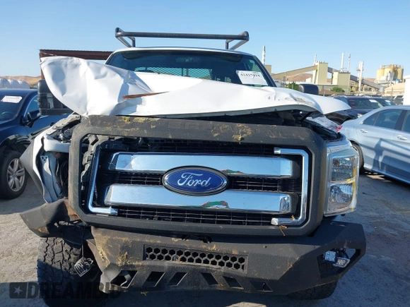 2014 Ford F-350 z VIN 1FT7X3BT4EEA59761, wystawiony jako IAAI lot #42415018 z przebiegiem 104 591 mil mil oraz . Historia ofert i sprzedaży dostępna na DreamBid. Obrazek 12.