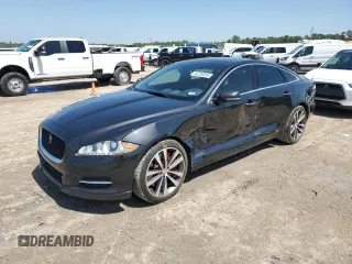 2013 Jaguar XJ with VIN SAJWA3HE9DMV49768, listed as a Copart auction lot 50339955 with 56,841 mi miles and Salvage Title. Bid and sale history available at DreamBid. Image 1.
