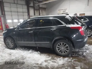 2018 Cadillac XT5 Luxury AWD with VIN 1GYKNDRSXJZ182299, listed as a IAAI auction lot 41628039 with 124,054 mi miles and . Bid and sale history available at DreamBid. Image 14.