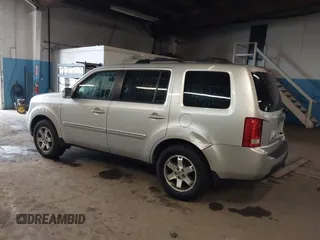 2009 Honda Pilot Touring with VIN 5FNYF48929B010331, listed as a IAAI auction lot 41965094 with 142,490 mi miles and . Bid and sale history available at carsss.com. Image 6.