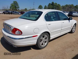 2002 Jaguar X-Type with VIN SAJEA51C22WC27350, listed as a IAAI auction lot 41778528 with 163,600 mi miles and . Bid and sale history available at DreamBid. Image 4.