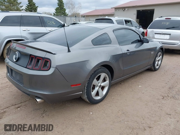 2013 Ford Mustang GT with VIN 1ZVBP8CF1D5261761, listed as a IAAI auction lot 42173607 with 76,658 mi miles and . Bid and sale history available at DreamBid. Image 4.