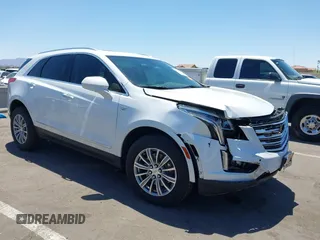 2019 Cadillac XT5 Luxury FWD with VIN 1GYKNCRS5KZ182111, listed as a IAAI auction lot 42327279 with 71,884 mi miles and . Bid and sale history available at DreamBid. Image 1.