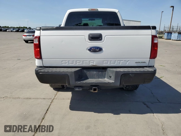 2014 Ford F-250 XL with VIN 1FT7X2B64EEB66846, listed as a Copart auction lot 57212565 with 261,721 mi miles and Salvage title. Bid and sale history available at DreamBid. Image 6.