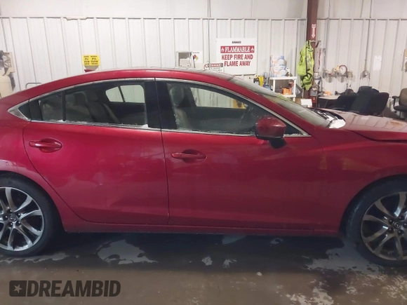2017 Mazda 6 Grand Touring with VIN JM1GL1X57H1135401, listed as a IAAI auction lot 41722330 with 100,869 mi miles. Bid and sale history available at carsss.com. Image 14.