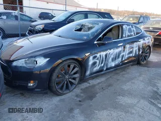 2013 Tesla Model S with VIN 5YJSA1CNODFP07903, listed as a IAAI auction lot 41281788 with Not Provided miles. Bid and sale history available at carsss.com. Image 19.