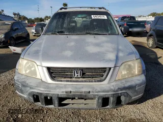 2000 Honda CR-V LX with VIN JHLRD1741YC030308, listed as a Copart auction lot 84634014 with 254,772 mi miles and Salvage Title. Bid and sale history available at carsss.com. Image 5.