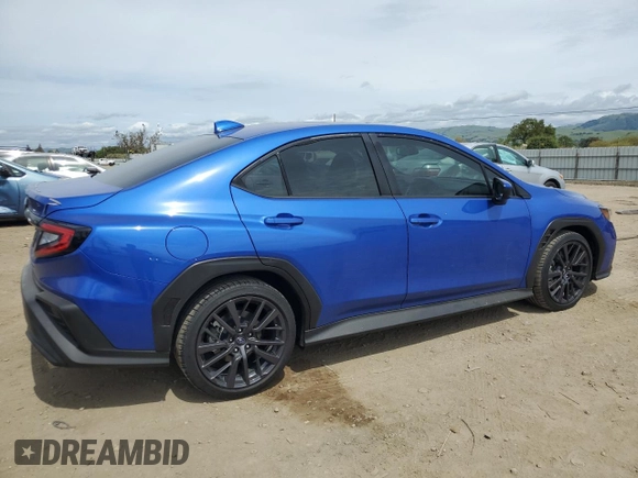 2023 Subaru WRX Premium with VIN JF1VBAF65P9824749, listed as a Copart auction lot 52210825 with 4,965 mi miles and Salvage title. Bid and sale history available at DreamBid. Image 3.
