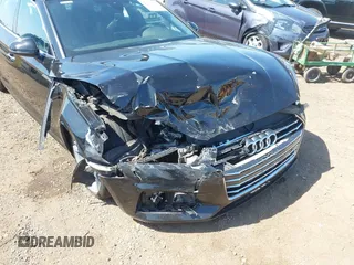 2018 Audi A5 Sportback Premium z VIN WAUANCF53JA003557, wystawiony jako IAAI lot #42079150 z przebiegiem 78 259 mil mil oraz . Historia ofert i sprzedaży dostępna na DreamBid. Obrazek 6.