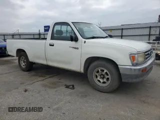 1997 Toyota T100 with VIN JT4JM11D9V0019752, listed as a Copart auction lot 82449524 with 279,981 mi miles and Salvage Title. Bid and sale history available at DreamBid. Image 4.