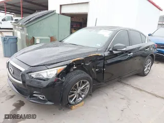 2014 Infiniti Q50 with VIN JN1BV7AP5EM674324, listed as a IAAI auction lot 39309092 with 112,779 mi miles. Bid and sale history available at carsss.com. Image 2.
