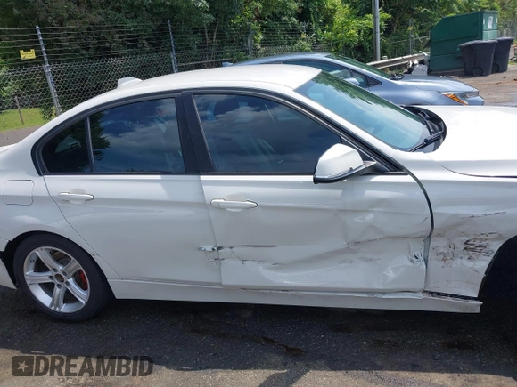 2014 BMW 3 Series 328i with VIN WBA3C1C5XEK107826, listed as a IAAI auction lot 42481701 with 104,151 mi miles and . Bid and sale history available at DreamBid. Image 13.