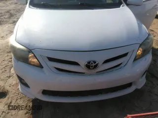 2011 Toyota Corolla L with VIN 2T1BU4EE3BC614784, listed as a IAAI auction lot 42024386 with 210,901 mi miles. Bid and sale history available at carsss.com. Image 6.