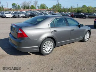 2011 Ford Fusion Hybrid with VIN 3FADP0L34BR290335, listed as a IAAI auction lot 42094674 with 171,391 mi miles. Bid and sale history available at carsss.com. Image 4.