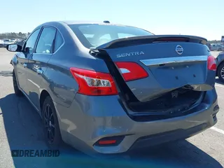 2018 Nissan Sentra SV with VIN 3N1AB7AP3JL633148, listed as a IAAI auction lot 41983588 with 148,479 mi miles and . Bid and sale history available at DreamBid. Image 3.