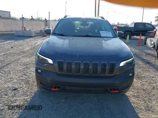 2019 Jeep Cherokee Trailhawk with VIN 1C4PJMBX3KD246100, listed as a IAAI auction lot 41191581 with 98,124 mi miles and . Bid and sale history available at DreamBid. Image 12.