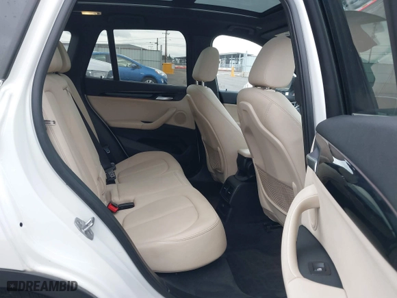 2018 BMW X1 sDrive28i with VIN WBXHU7C32J5H44246, listed as a IAAI auction lot 41477050 with 69,858 mi miles. Bid and sale history available at carsss.com. Image 8.