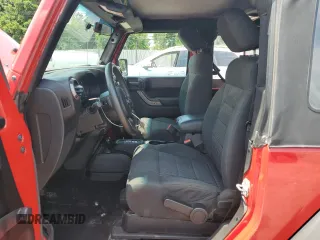 2012 Jeep Wrangler Sport with VIN 1C4AJWAG9CL212222, listed as a Copart auction lot 61919275 with 183,729 mi miles and Clean title. Bid and sale history available at DreamBid. Image 7.