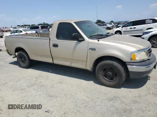 2000 Ford F-150 XL with VIN 1FTZF172XYNB65958, listed as a Copart auction lot 59946145 with 208,988 mi miles and Salvage title. Bid and sale history available at DreamBid. Image 4.