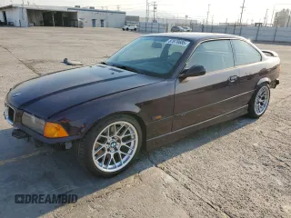 1995 BMW 3 Series M3 with VIN WBSBF9324SEH03062, listed as a Copart auction lot 87878685 with 251,070 mi miles and Salvage Title. Bid and sale history available at carsss.com. Image 1.