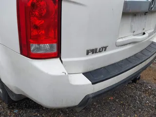 2011 Honda Pilot EX-L with VIN 5FNYF4H57BB009999, listed as a IAAI auction lot 41402317 with 161,805 mi miles. Bid and sale history available at carsss.com. Image 14.