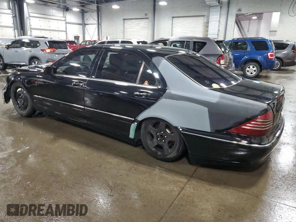 2005 Mercedes-Benz S-Class 4.3L with VIN WDBNG83J95A459421, listed as a Copart auction lot 77153264 with 168,360 mi miles and Salvage Title. Bid and sale history available at carsss.com. Image 2.