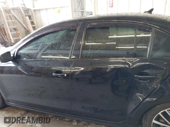 2016 Volkswagen Jetta Sport z VIN 3VWD17AJ0GM283938, wystawiony jako IAAI lot #41861923 z przebiegiem 118 418 mil mil oraz . Historia ofert i sprzedaży dostępna na DreamBid. Obrazek 14.