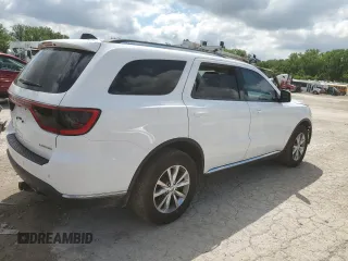 2015 Dodge Durango Limited with VIN 1C4RDJDGXFC170110, listed as a Copart auction lot 58037295 with 154,099 mi miles and Salvage title. Bid and sale history available at DreamBid. Image 3.