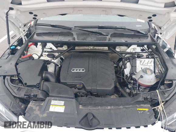 2021 Audi Q5 Premium Plus z VIN WA1BAAFY8M2077292, wystawiony jako IAAI lot #41663216 z przebiegiem 35 378 mil mil oraz . Historia ofert i sprzedaży dostępna na DreamBid. Obrazek 10.