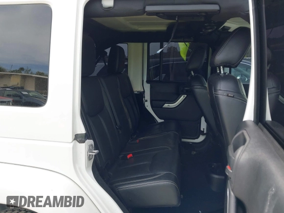 2015 Jeep Wrangler Unlimited Rubicon Hard Rock с VIN 1C4HJWFG7FL684057, выставлен на аукционе IAAI как лот 41963885 с пробегом 103 240 миль миль и . История ставок и продаж доступна на DreamBid. Изображение 8.