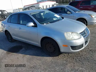 2009 Volkswagen Jetta S z VIN 3VWJM71K09M041494, wystawiony jako IAAI lot #41863110 z przebiegiem Nie podano mil oraz . Historia ofert i sprzedaży dostępna na DreamBid. Obrazek 1.