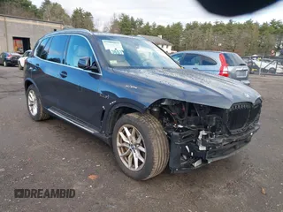 2022 BMW X5 xDrive45e with VIN 5UXTA6C05N9K75681, listed as a IAAI auction lot 40954930 with 13,463 mi miles. Bid and sale history available at carsss.com. Image 1.