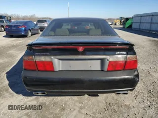 2000 Cadillac Seville Touring STS z VIN 1G6KY5495YU177352, wystawiony jako Copart lot #86020444 z przebiegiem Nie podano mil oraz Szkoda całkowita • Salvage title. Historia ofert i sprzedaży dostępna na DreamBid. Obrazek 6.