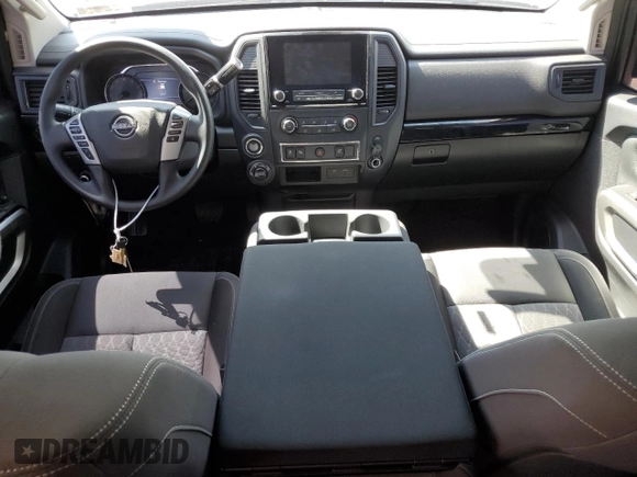 2024 Nissan Titan SV with VIN 1N6AA1EC2RN101063, listed as a Copart auction lot 49879235 with 12,418 mi miles and Salvage title. Bid and sale history available at DreamBid. Image 8.