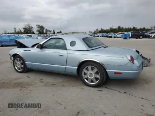 2004 Ford Thunderbird Deluxe with VIN 1FAHP60A44Y111156, listed as a Copart auction lot 79000014 with 42,101 mi miles and Salvage Title. Bid and sale history available at DreamBid. Image 2.