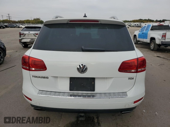 2013 Volkswagen Touareg Sport с VIN WVGEP9BP9DD003974, выставлен на аукционе Copart как лот 75106234 с пробегом 211 323 миль миль и Чистый • Clean title. История ставок и продаж доступна на DreamBid. Изображение 6.