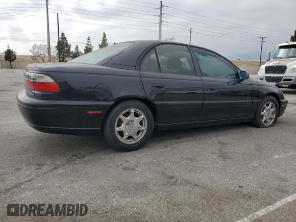 1997 Cadillac Catera z VIN W06VR52RXVR092016, wystawiony jako Copart lot #54067575 z przebiegiem 63 978 mil mil oraz Tytuł czysty. Historia ofert i sprzedaży dostępna na DreamBid. Obrazek 3.