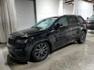 2018 Jeep Grand Cherokee Overland with VIN 1C4RJFCG1JC287784, listed as a Copart auction lot 50391255 with 105,981 mi miles and Salvage title. Bid and sale history available at DreamBid. Image 1.