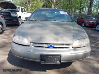 1999 Chevrolet Lumina with VIN 2G1WL52M3X9189217, listed as a IAAI auction lot 42082029 with 211,500 mi miles. Bid and sale history available at carsss.com. Image 6.