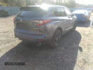 2020 Acura RDX w/A-Spec Pkg with VIN 5J8TC2H68LL040050, listed as a IAAI auction lot 41513493 with 128,217 mi miles. Bid and sale history available at carsss.com. Image 4.