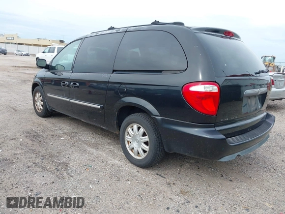 2005 Chrysler Town & Country Touring with VIN 2C4GP54L45R277761, listed as a IAAI auction lot 42144191 with 140,864 mi miles and . Bid and sale history available at DreamBid. Image 3.