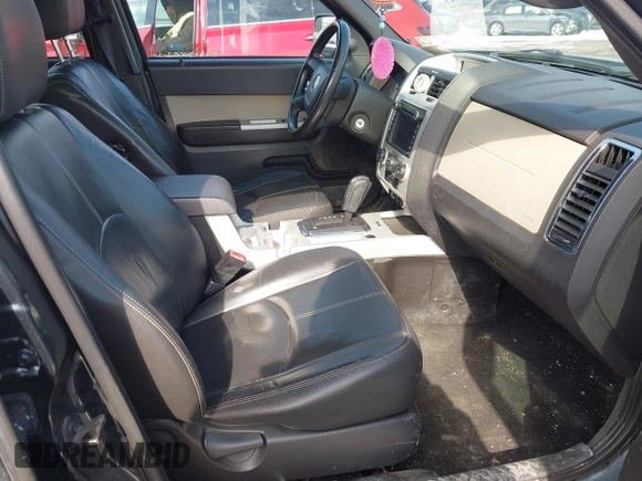 2010 Mercury Mariner Premier with VIN 4M2CN9HG6AKJ27176, listed as a IAAI auction lot 41607396 with 131,213 mi miles and . Bid and sale history available at DreamBid. Image 5.