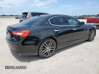 2014 Maserati Ghibli S Q4 with VIN ZAM57RTA8E1097777, listed as a Copart auction lot 59604665 with 86,135 mi miles and Salvage title. Bid and sale history available at DreamBid. Image 3.