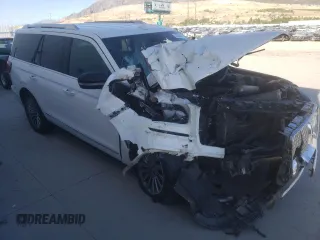 2020 Lincoln Navigator with VIN 5LMJJ2NT0LEL07488, listed as a Copart auction lot 73396634 with Not provided miles and Salvage title. Bid and sale history available at DreamBid. Image 4.