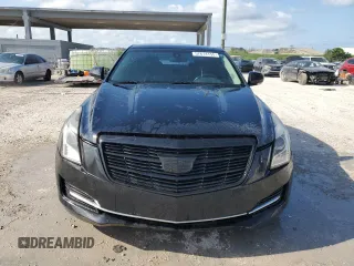 2017 Cadillac ATS Luxury RWD z VIN 1G6AB5RX3H0157189, wystawiony jako Copart lot #57614155 z przebiegiem 141 475 mil mil oraz Czysty tytuł • Clean title. Historia ofert i sprzedaży dostępna na DreamBid. Obrazek 5.