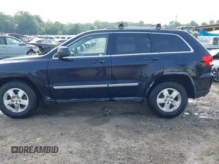 2011 Jeep Grand Cherokee Laredo with VIN 1J4RR4GG5BC622628, listed as a IAAI auction lot 42402893 with 163,731 mi miles and . Bid and sale history available at DreamBid. Image 15.