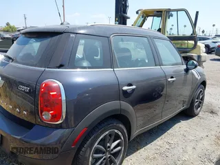 2016 MINI Countryman with VIN WMWZB3C55GWR46917, listed as a IAAI auction lot 42421995 with 23,157 mi miles and . Bid and sale history available at DreamBid. Image 4.