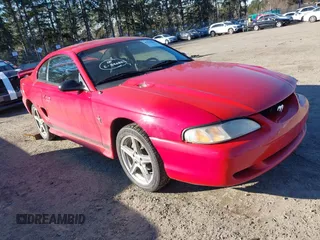 1996 Ford Mustang with VIN 1FALP4042TF180575, listed as a IAAI auction lot 41561882 with 248,183 mi miles. Bid and sale history available at carsss.com. Image 1.