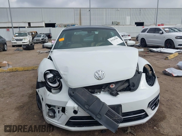 2019 Volkswagen Beetle S with VIN 3VWFD7AT2KM701622, listed as a IAAI auction lot 41520300 with Not provided miles and . Bid and sale history available at DreamBid. Image 13.